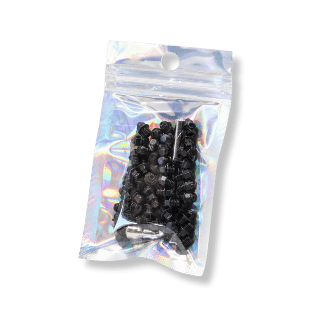 Packaged black Shortie Traction Pins with install tool in product baggie.