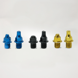 Blue, black, and gold Shortie and K9 Traction Pins lined up.